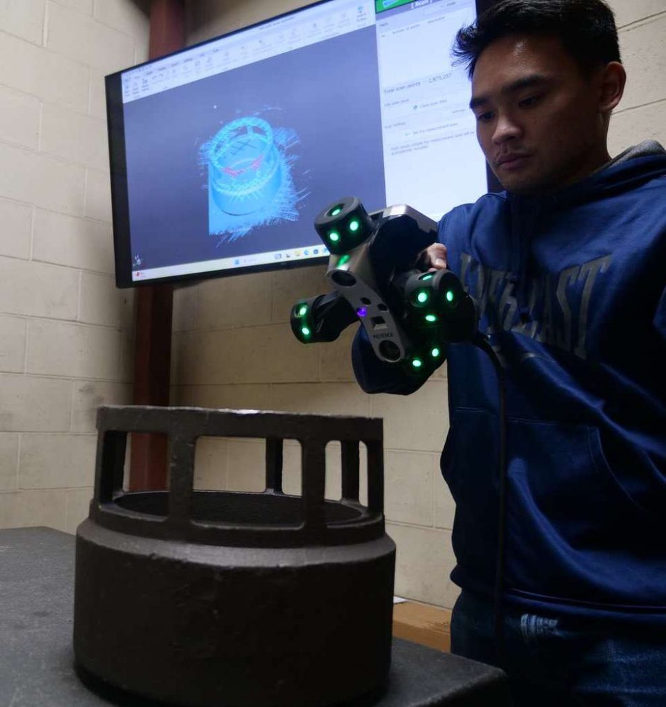 Quality and Inspections Person testing part