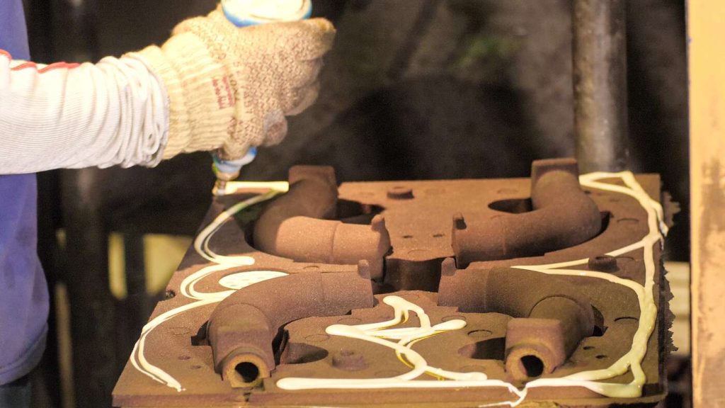 Shell molding: assembling two halves of mold (cope and drag) and cores