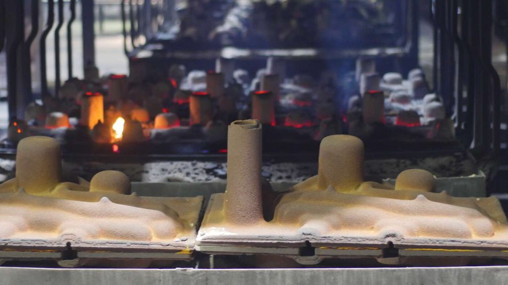 Pouring: new shell molds waiting to be poured